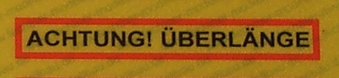 Aufkleber REFLEX-Warnschild "ACHTUNG! Ü" aus                