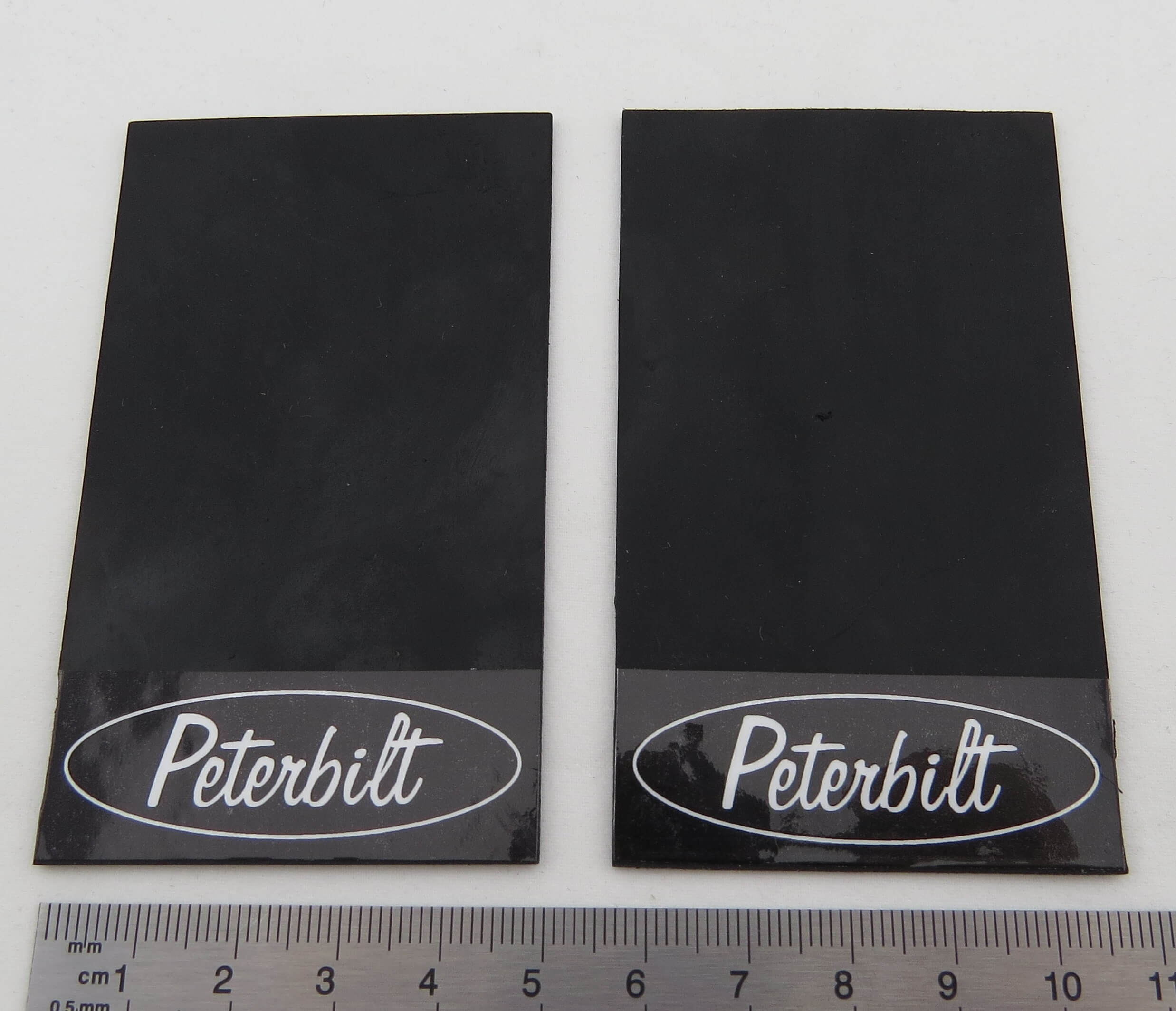 Paar Schmutzlappen 85 x 50mm (H x B) mit Logo/Text 1:8