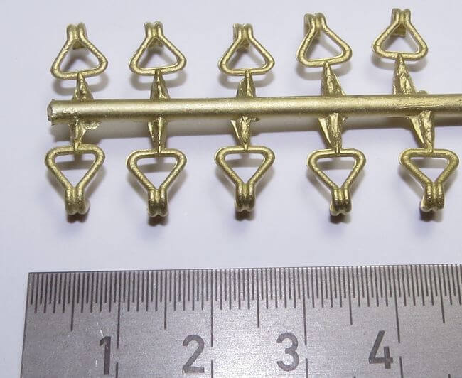 1 Set aus 10 Doppelhaken, groß.Messing-  Feinguss, am       