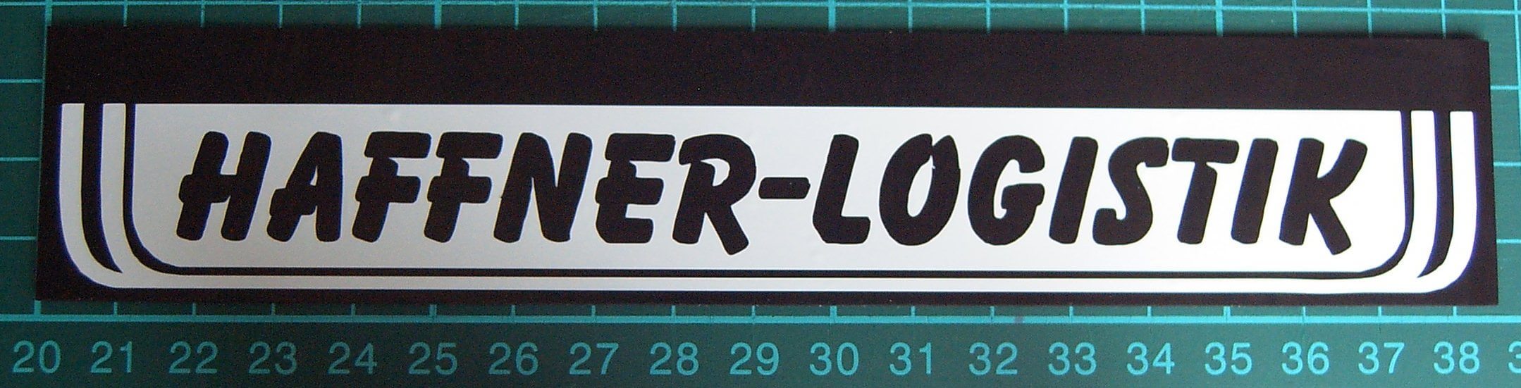 1 Schmutzfänger Nr.11 ca. 185x35x1mm mit geplottetem Text   