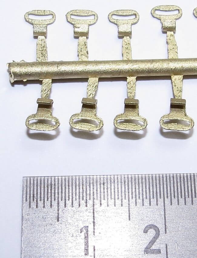 1 Set aus 8 Flachhaken, klein, Messing-  Feinguss, am