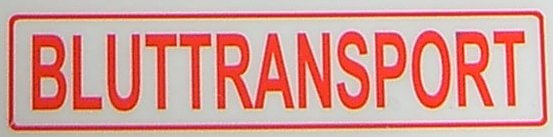 Textschild "BLUTTRANSPORT",rot,1:10 selbstklebende Folie    