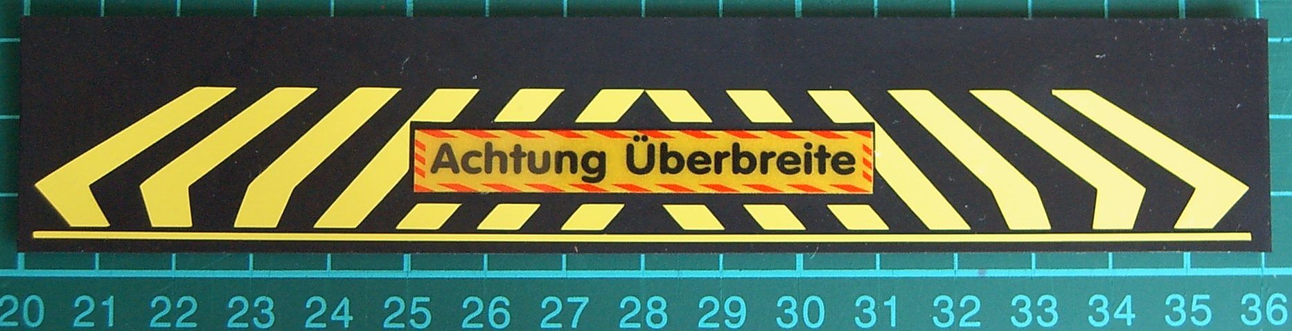 1 Schmutzfänger Nr.7 ca. 160x30x1mm mit  geplottetem Dekor  