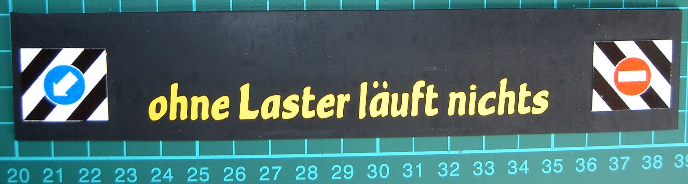 1 Schmutzfänger Nr.0 ca. 185x35x1mm mit  geplottetem Text   