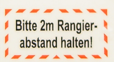 Textschild "Rangierabstand 2m" 2-zeilig  selbstklebende     