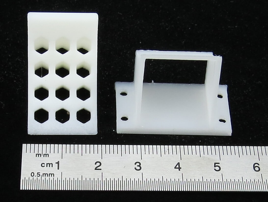 1x Unterlegkeil und 1x passender Halter                     