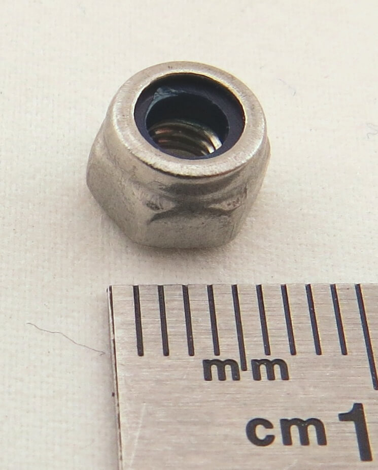 Stopmutter M4, Edelstahl, selbstsichernd SW 7mm, Gesamthöhe